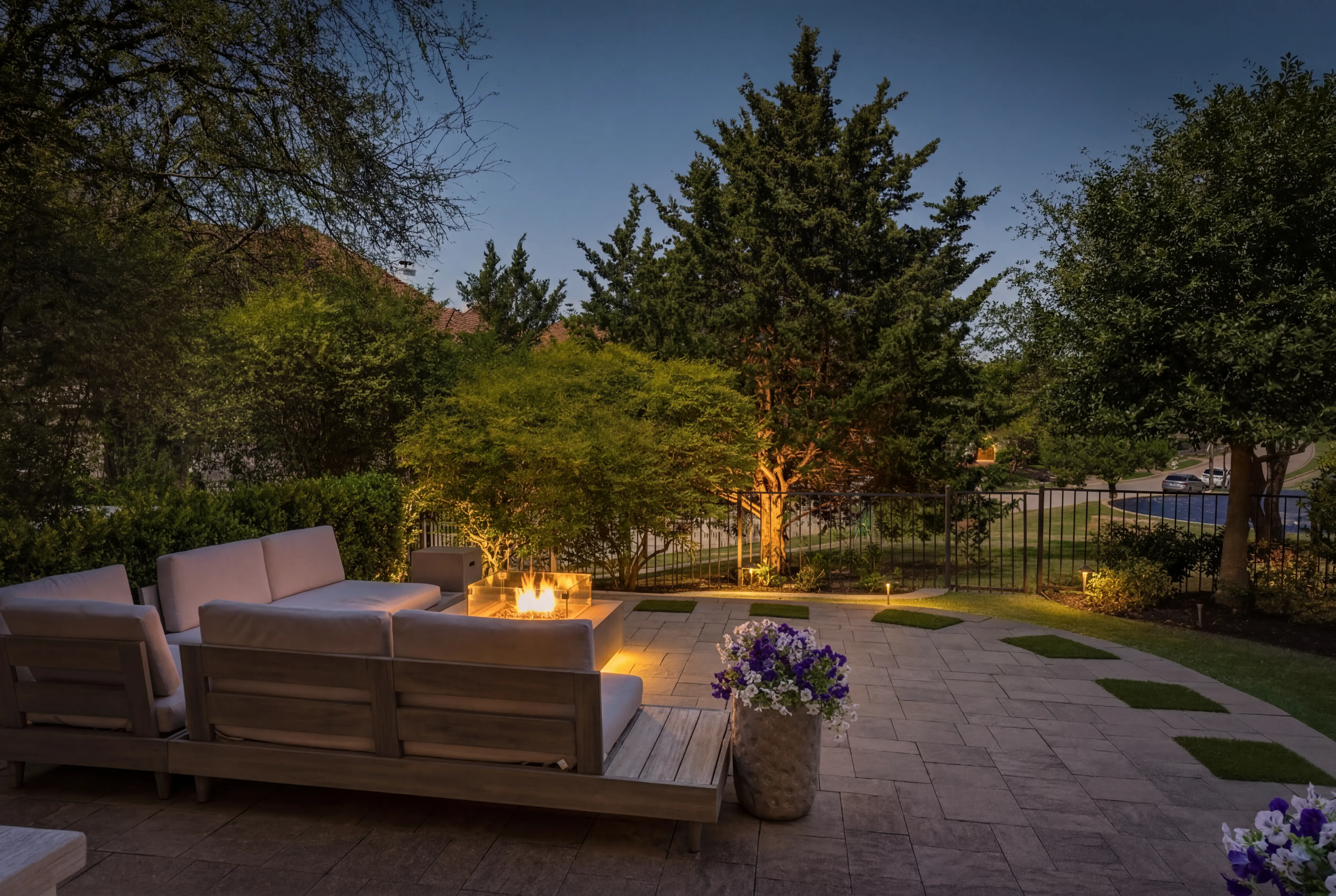 Private patio with fire pit at twilight